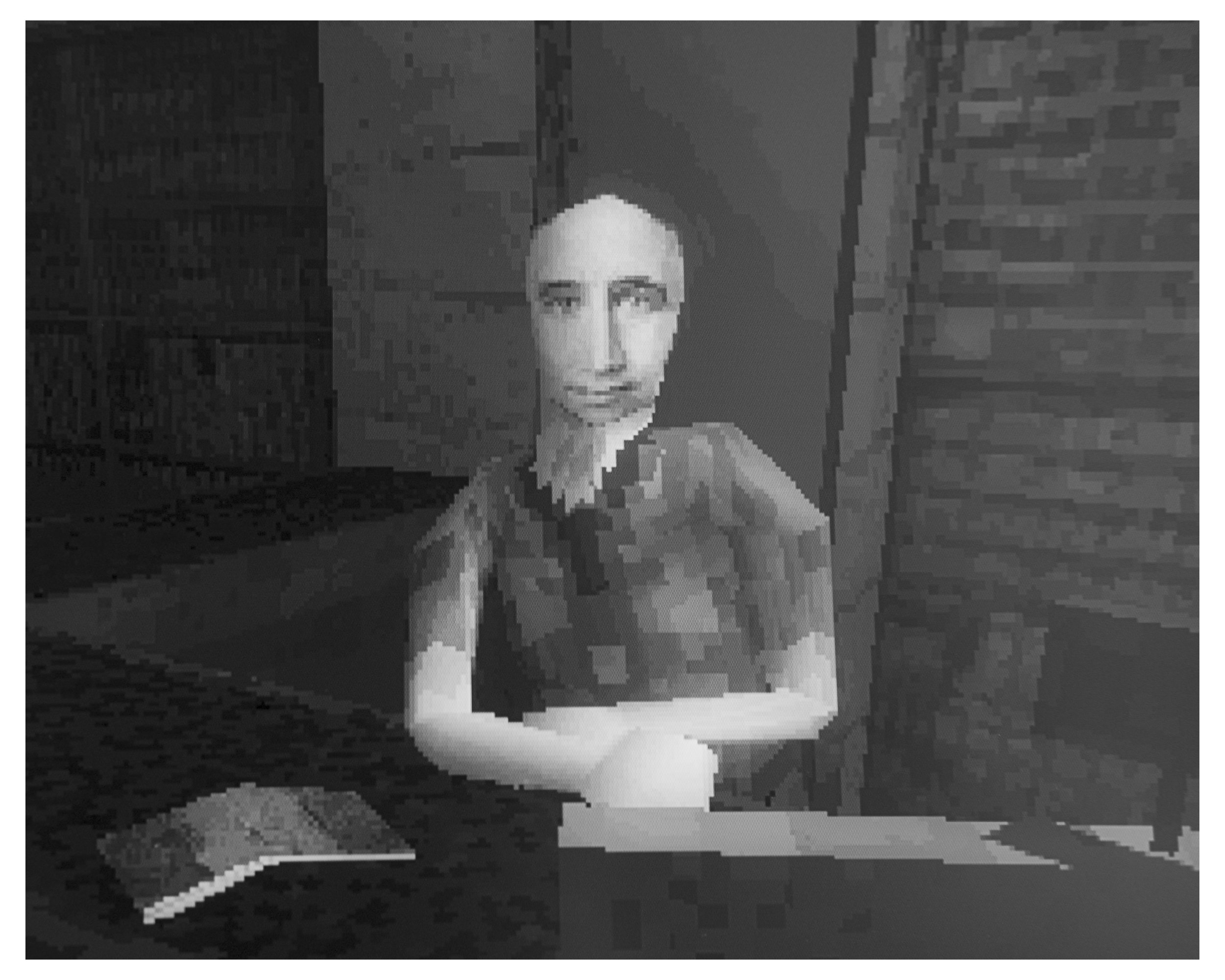 A pixelated black and white image of a person with glasses, sitting on the ground with their hands on their knees, in front of a background with trees and buildings.