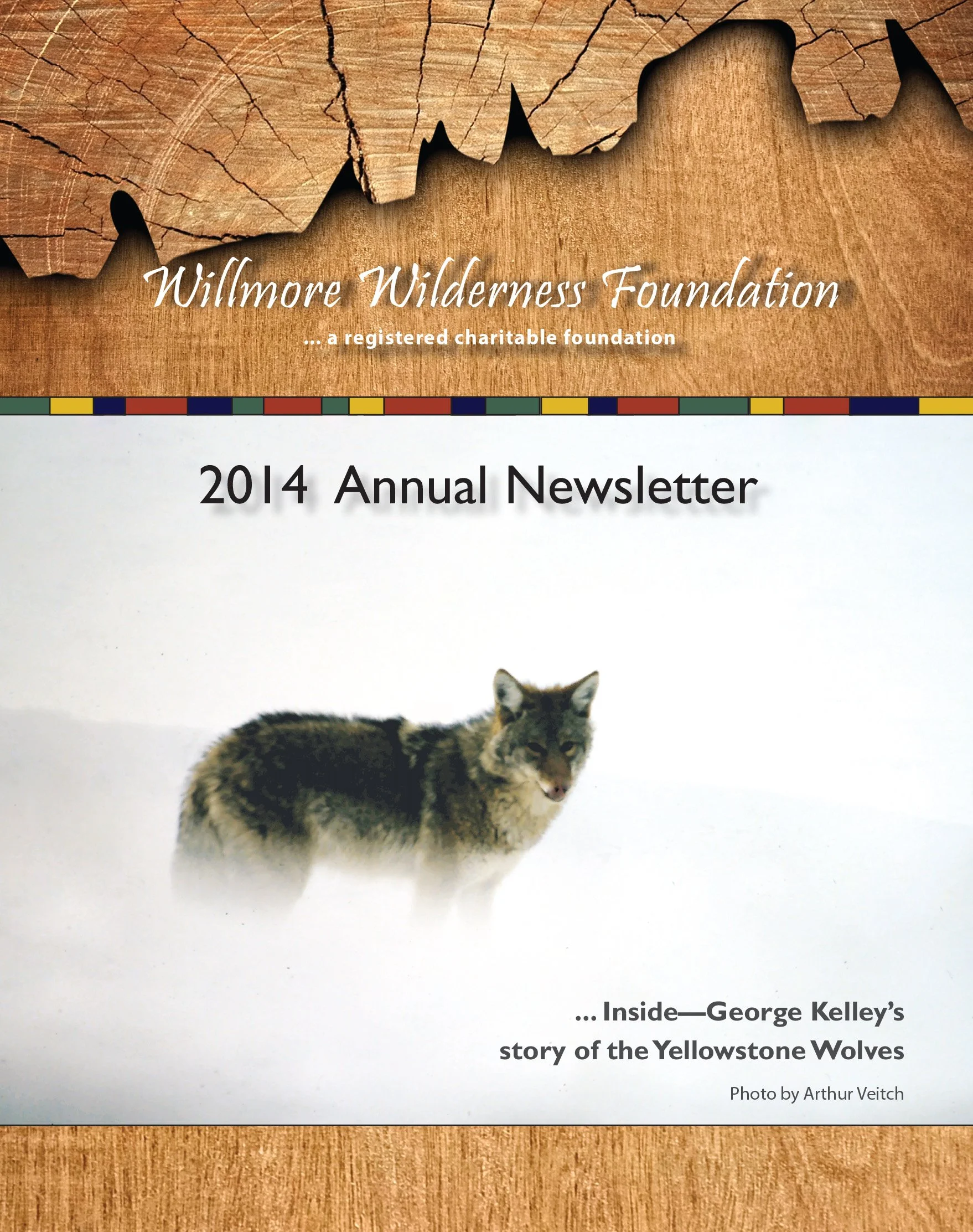 Cover of the Willmore Wilderness Foundation 2014 Annual Newsletter featuring a Yellowstone wolf photograph.