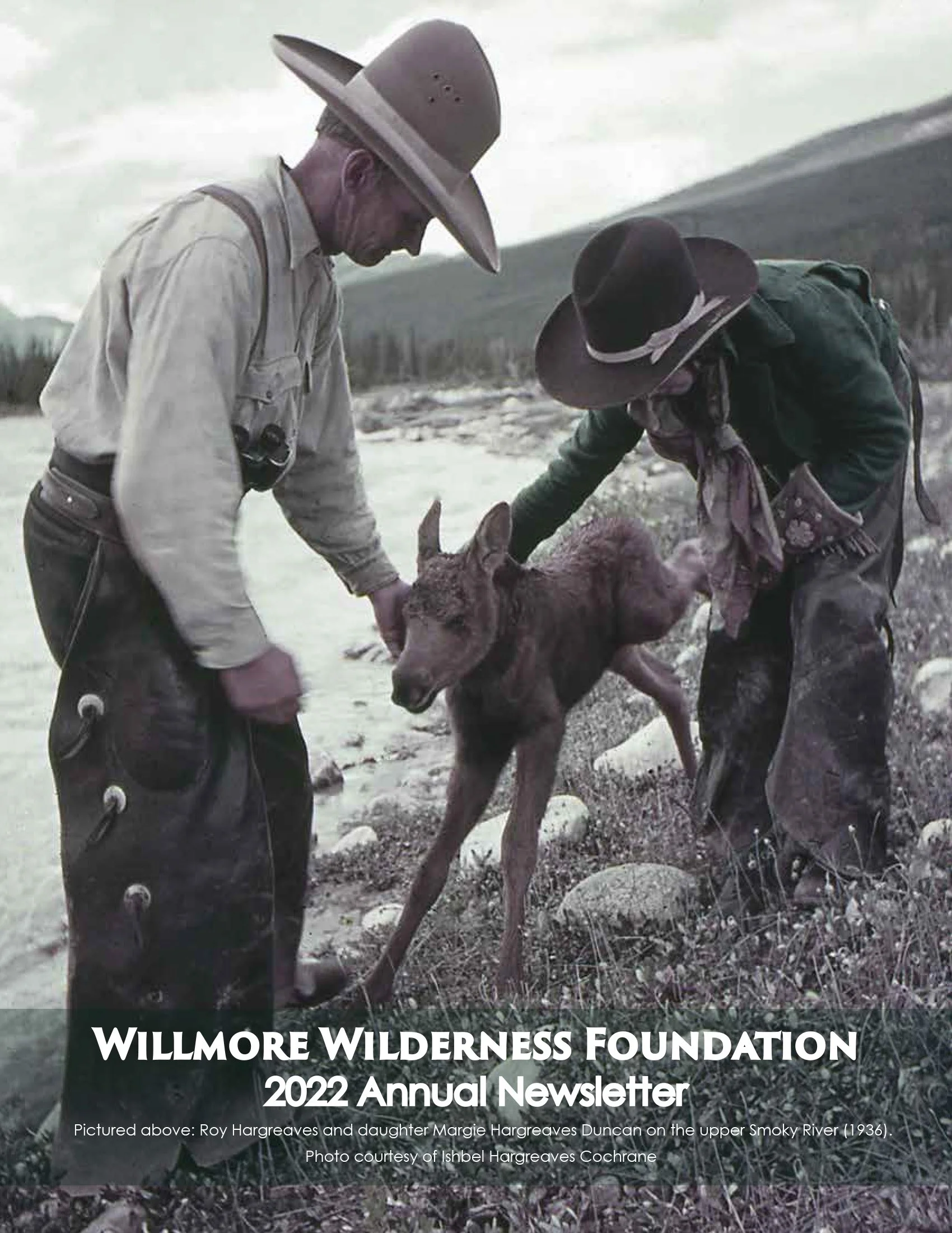 Historic photo of Roy Hargreaves and daughter Margie Hargreaves Duncan holding a deer beside the upper Smoky River, featured on the Willmore Wilderness Foundation 2022 annual newsletter cover.