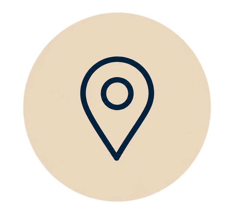 Dark blue location pin icon centered on a beige circular background