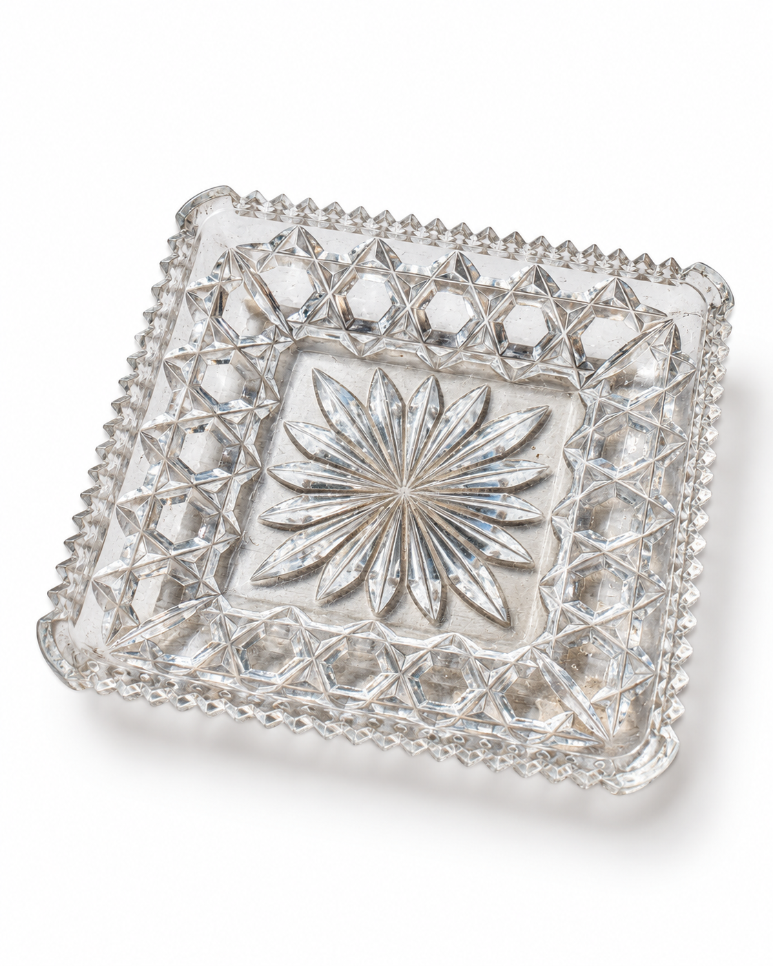 Vintage Indiana Glass Diamond Point clear square pressed glass serving dish with sawtooth edge and starburst center.