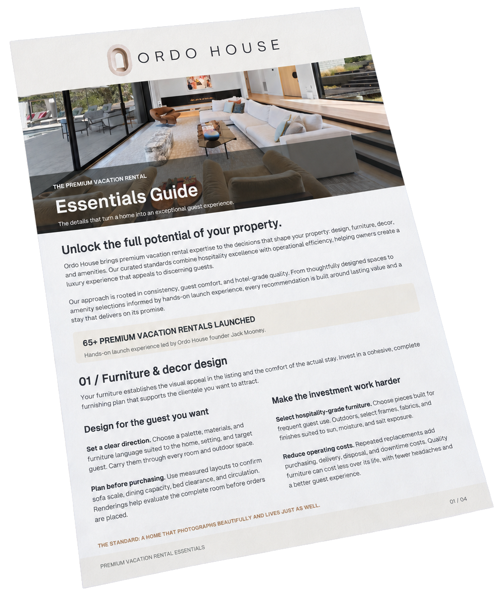 A digital brochure for Ordo House vacation rentals showing a modern living room with large windows, a white sofa, a brown armchair, a coffee table, and outdoor patio furniture through sliding glass doors.