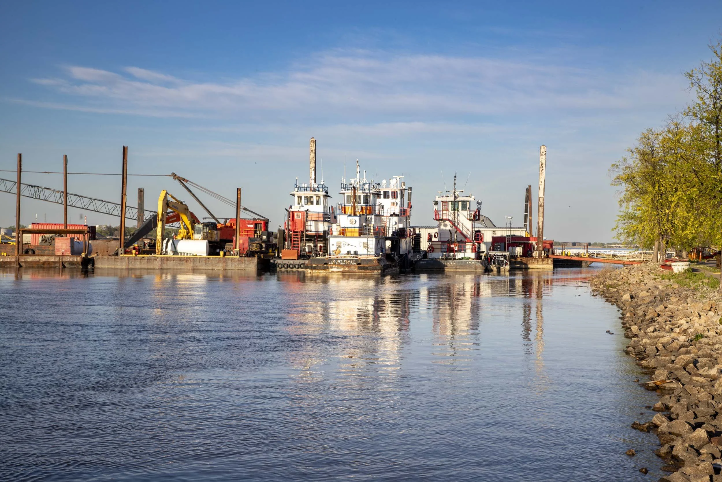Work boats at port near by Celebration Belle