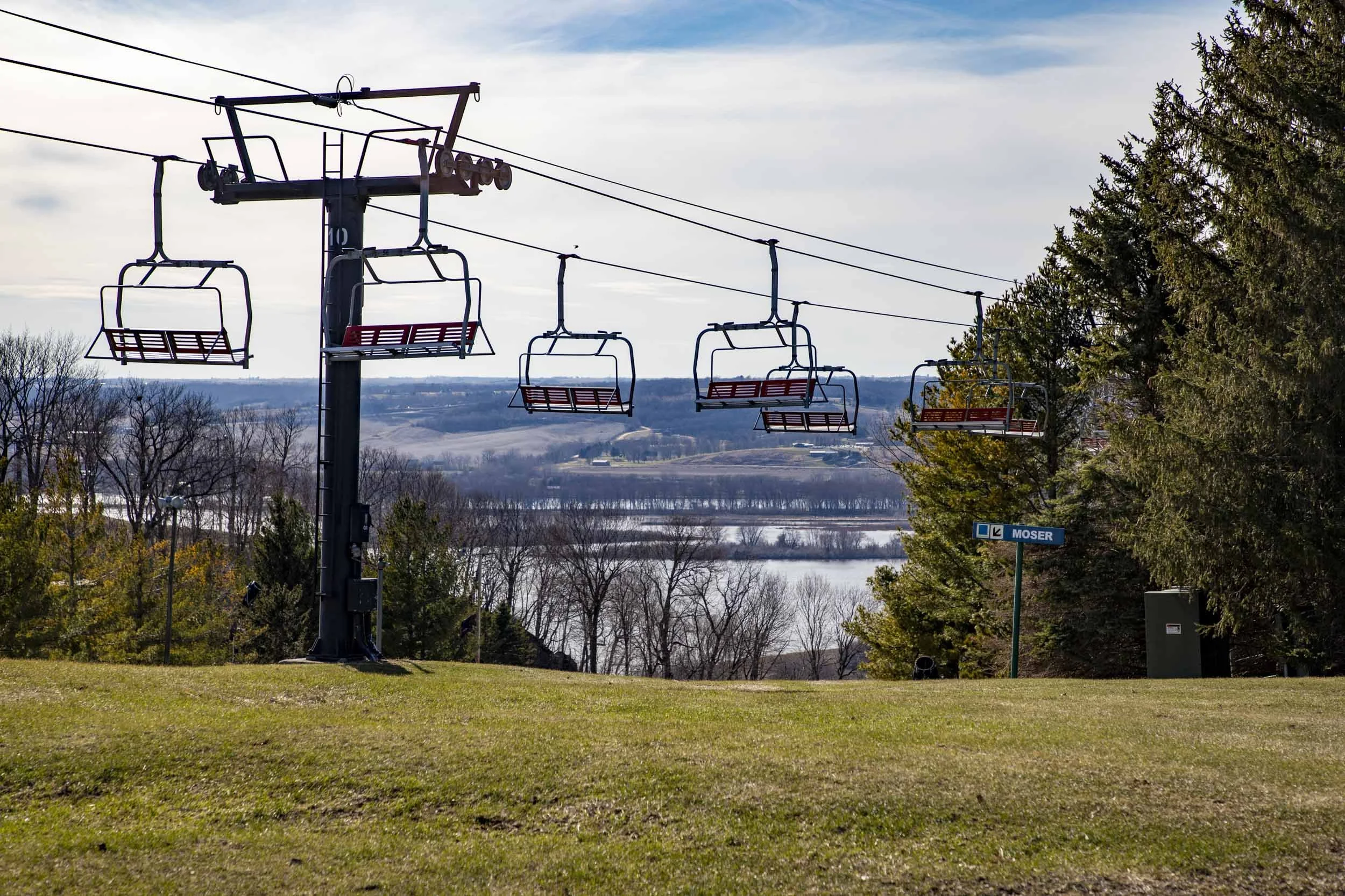 Ski lift at Chestnut Resort with the Mississippi River in the background.