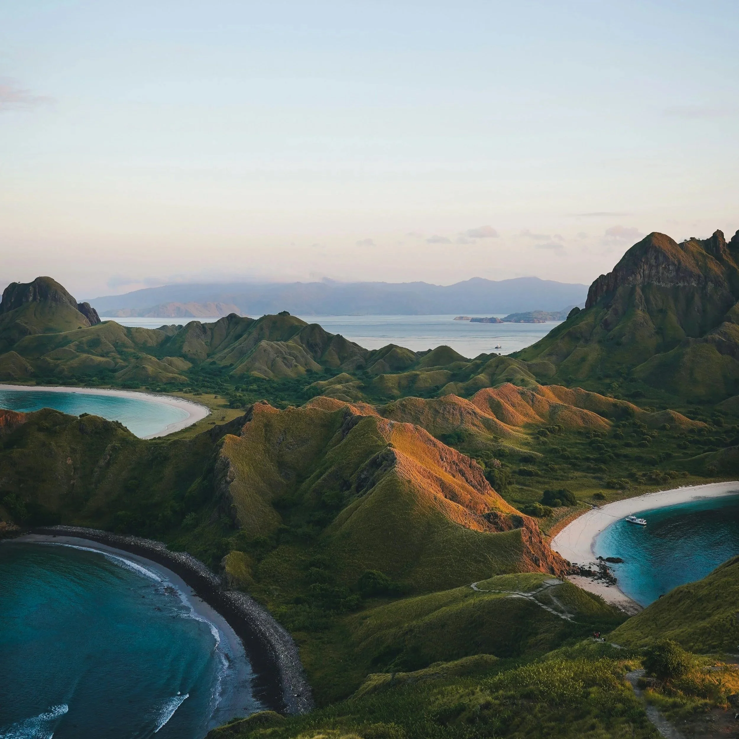 Coastal hills and turquoise bays — explore travel photography.