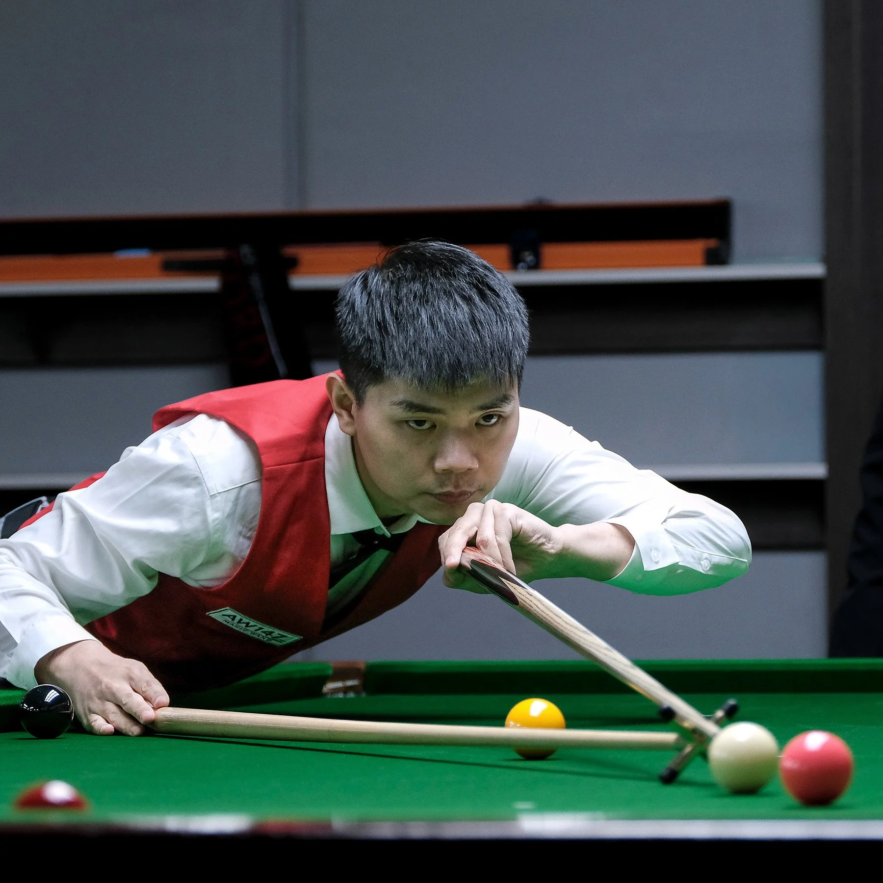 Shaun Wang, 2024 Queensland State Snooker Champion, at the snooker table