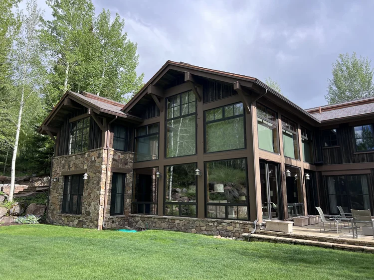 Mountain home with large exterior windows