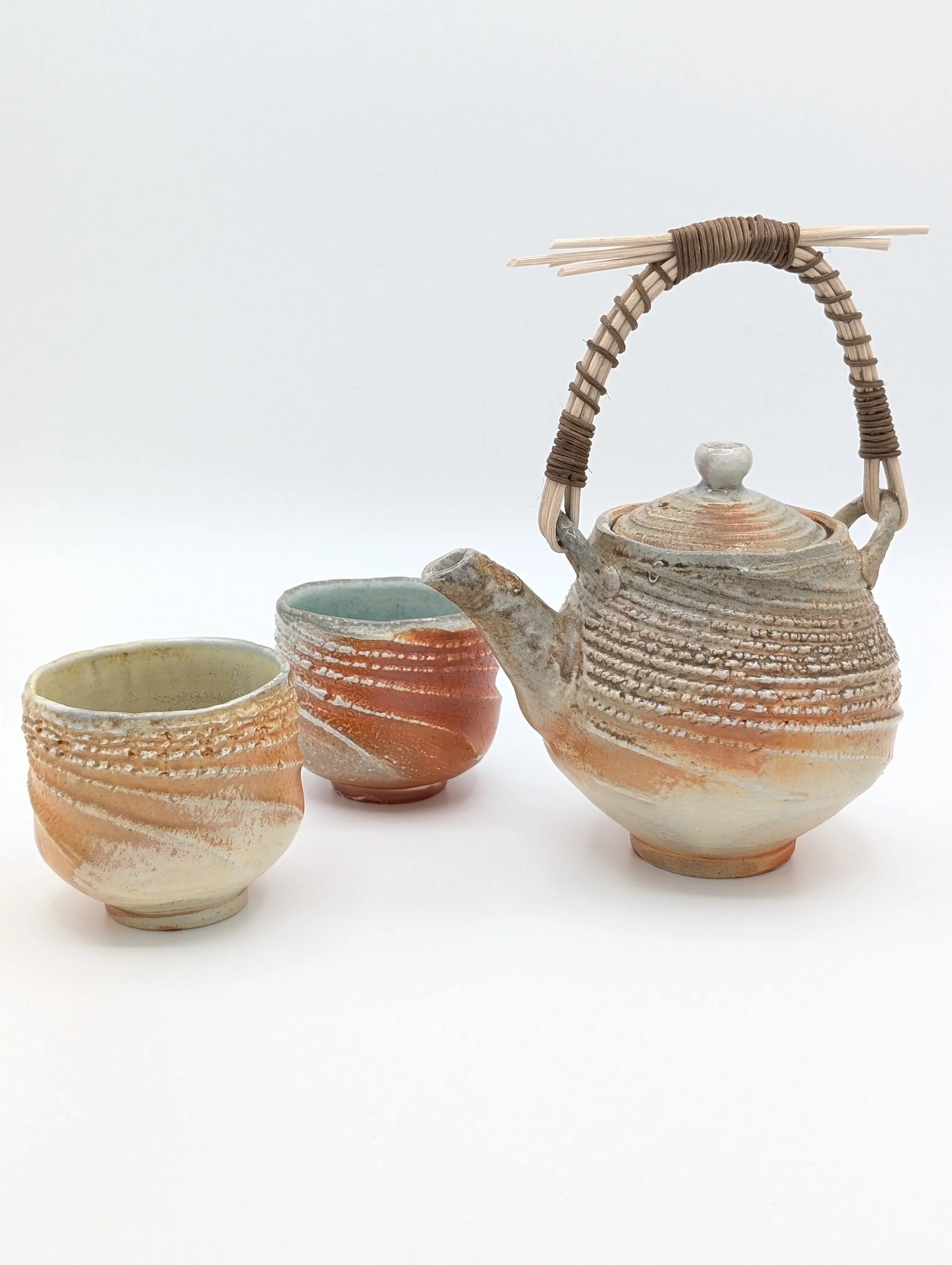 orange and yellow teapot and cup.jpg