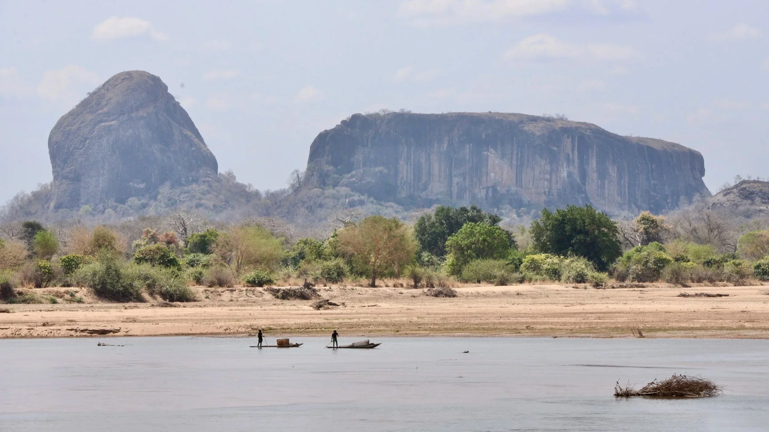 Large Granite inselbergs across the Lugenda River in Niassa, Northern Mozambique