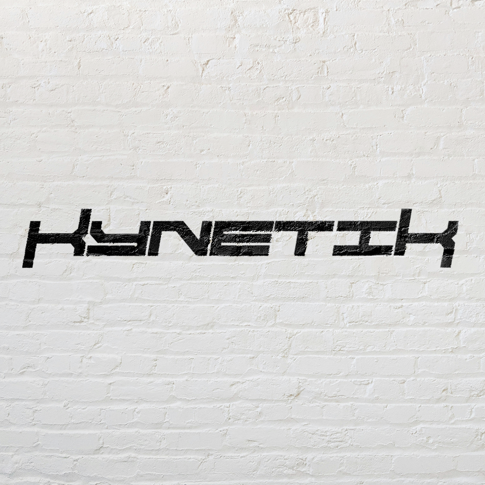 Black stencil-style text spelling 'HYNEXT' on a white brick wall.