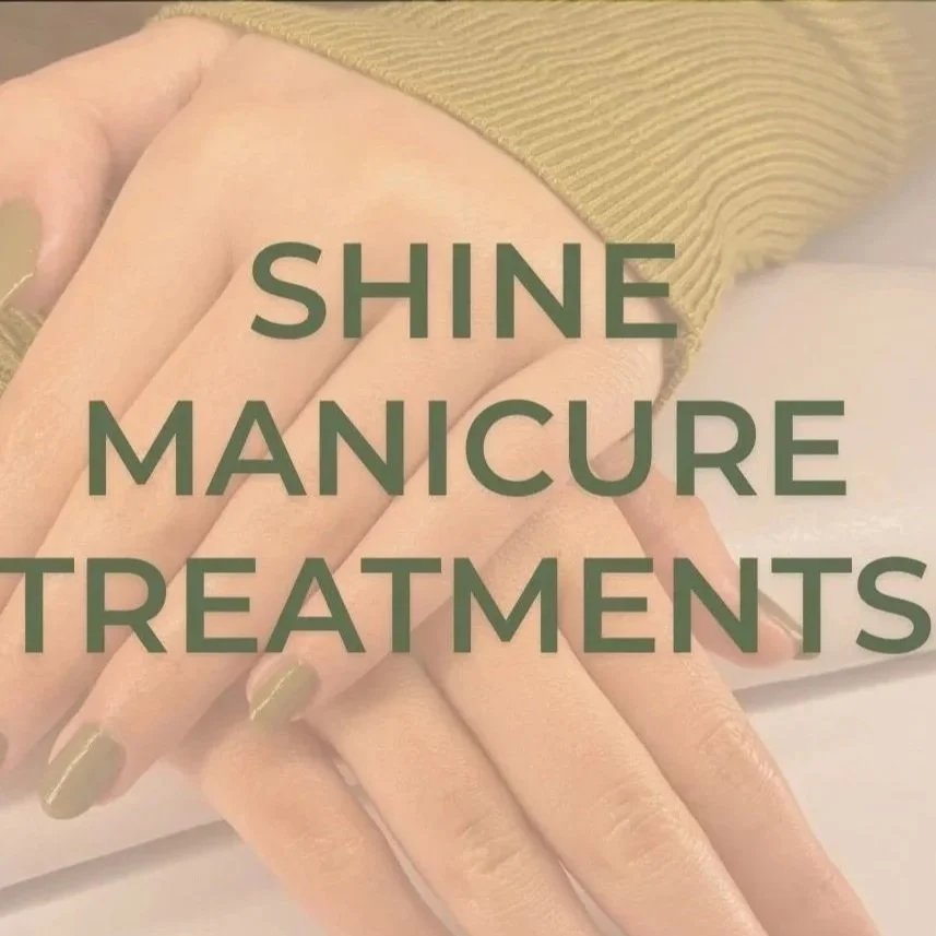 Close-up of a person's hands with well-manicured nails resting on a surface, with text overlay that says "Shine Manicure Treatments."