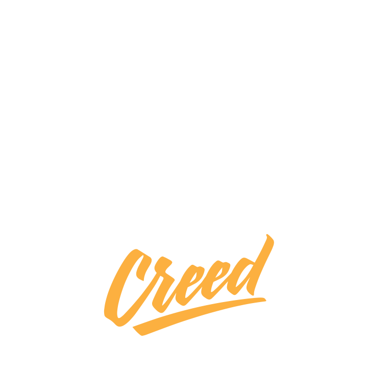 Graphic design featuring the words 'Corey Creed' with 'Corey' in small white uppercase letters at the top and 'Creed' in large orange cursive at the bottom, set against a black background.