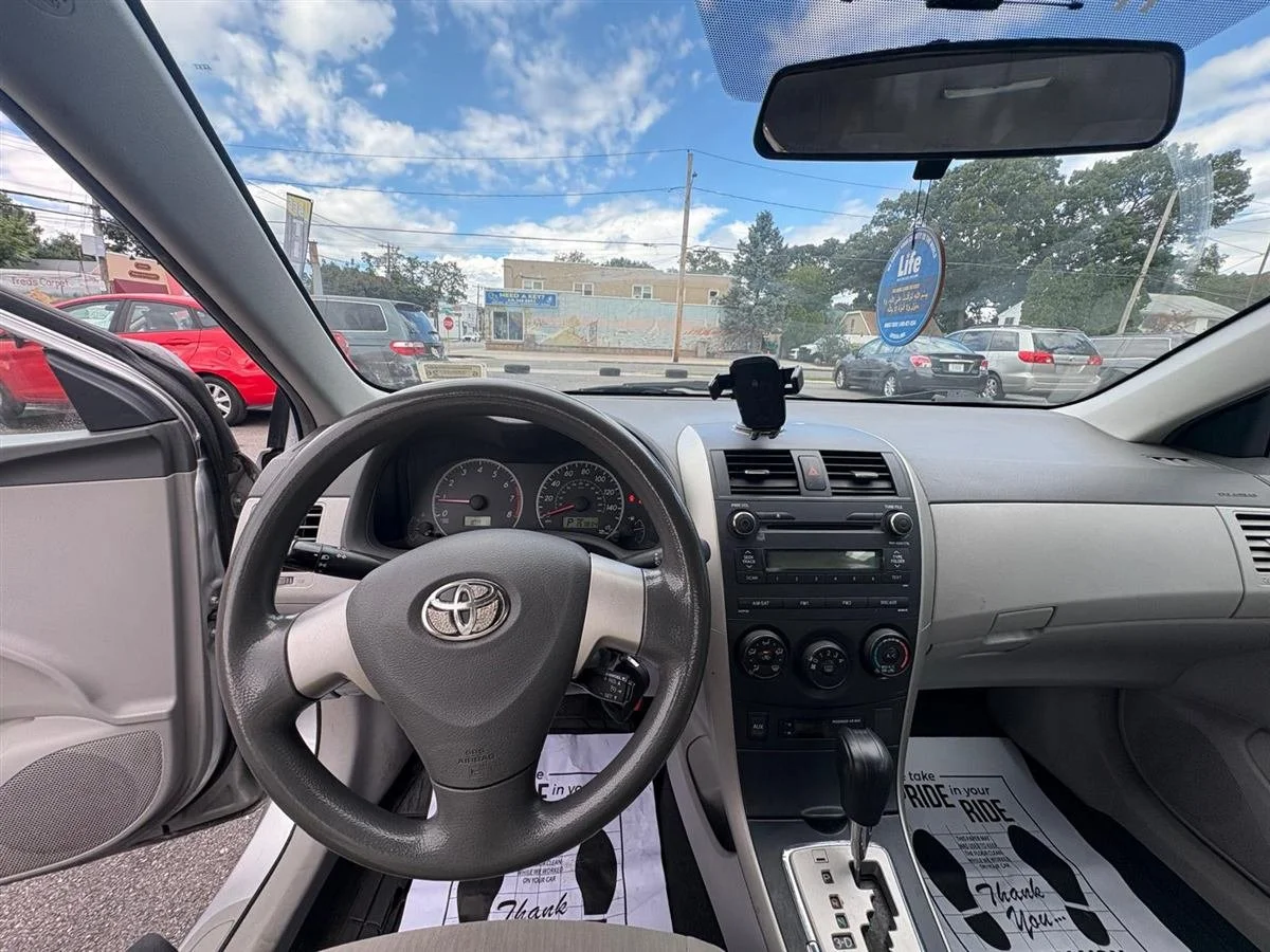 2010 Toyota Corolla, silver, dashboard and steering wheel