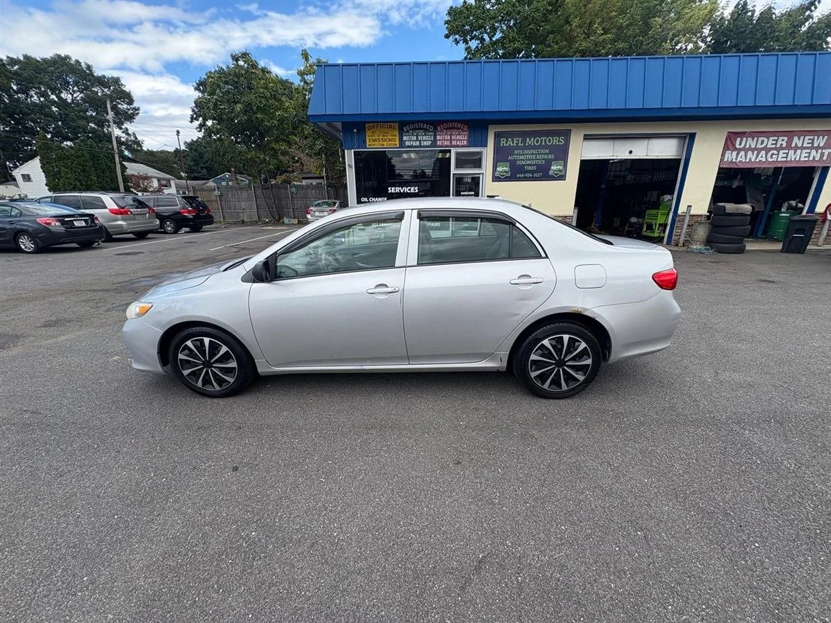 2010 Toyota Corolla, silver, rear view