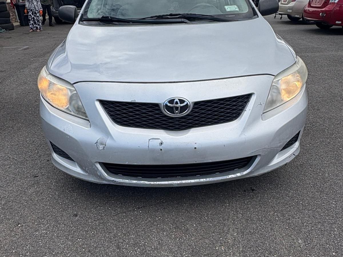 2010 Toyota Corolla, silver, front view