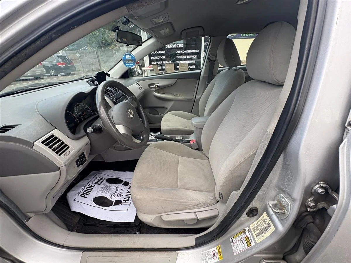 2010 Toyota Corolla, silver, front seats