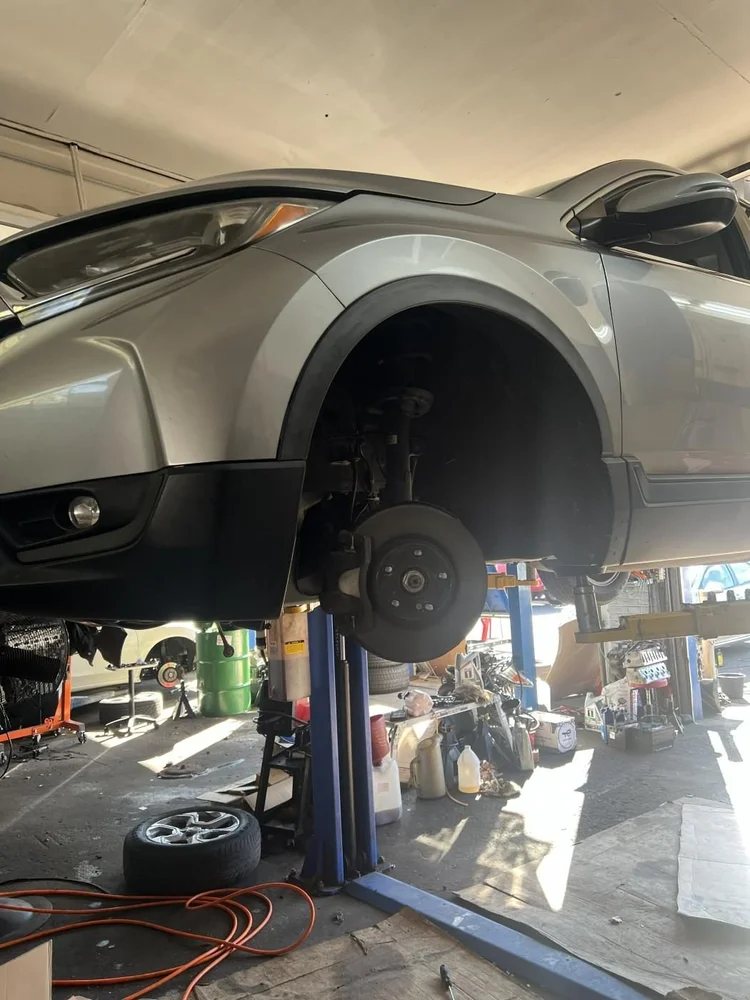 Brake and wheel service on a car at RAFL Motors