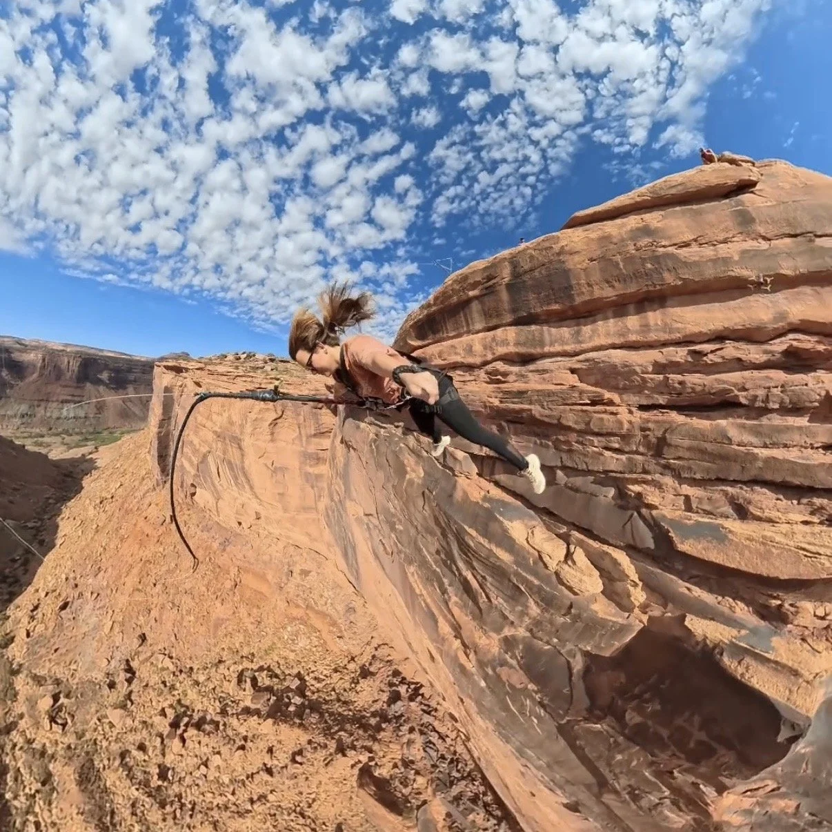 sending it off a 500' cliff with Moab Swingers