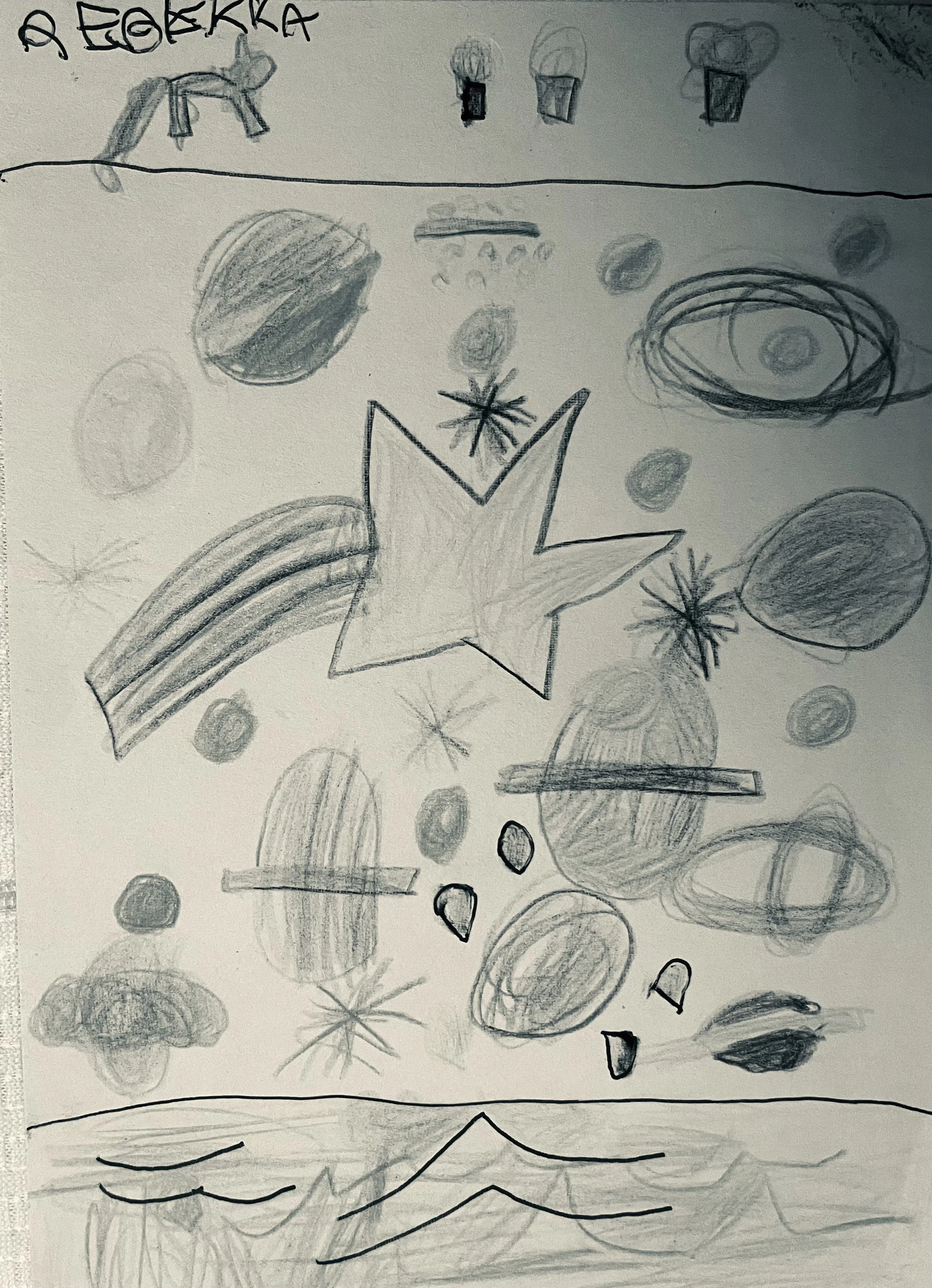 Hand-drawn pencil sketches of rocks, mountains, clouds, stars, and other nature-themed shapes on paper