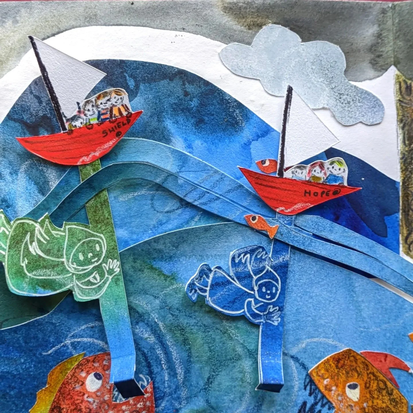 A colorful cutout collage illustration of a scene with two small paper boats in a body of water, labeled "SHIELD" and "HOPE", surrounded by smiling paper cutout characters, fish, clouds, and abstract waves.
