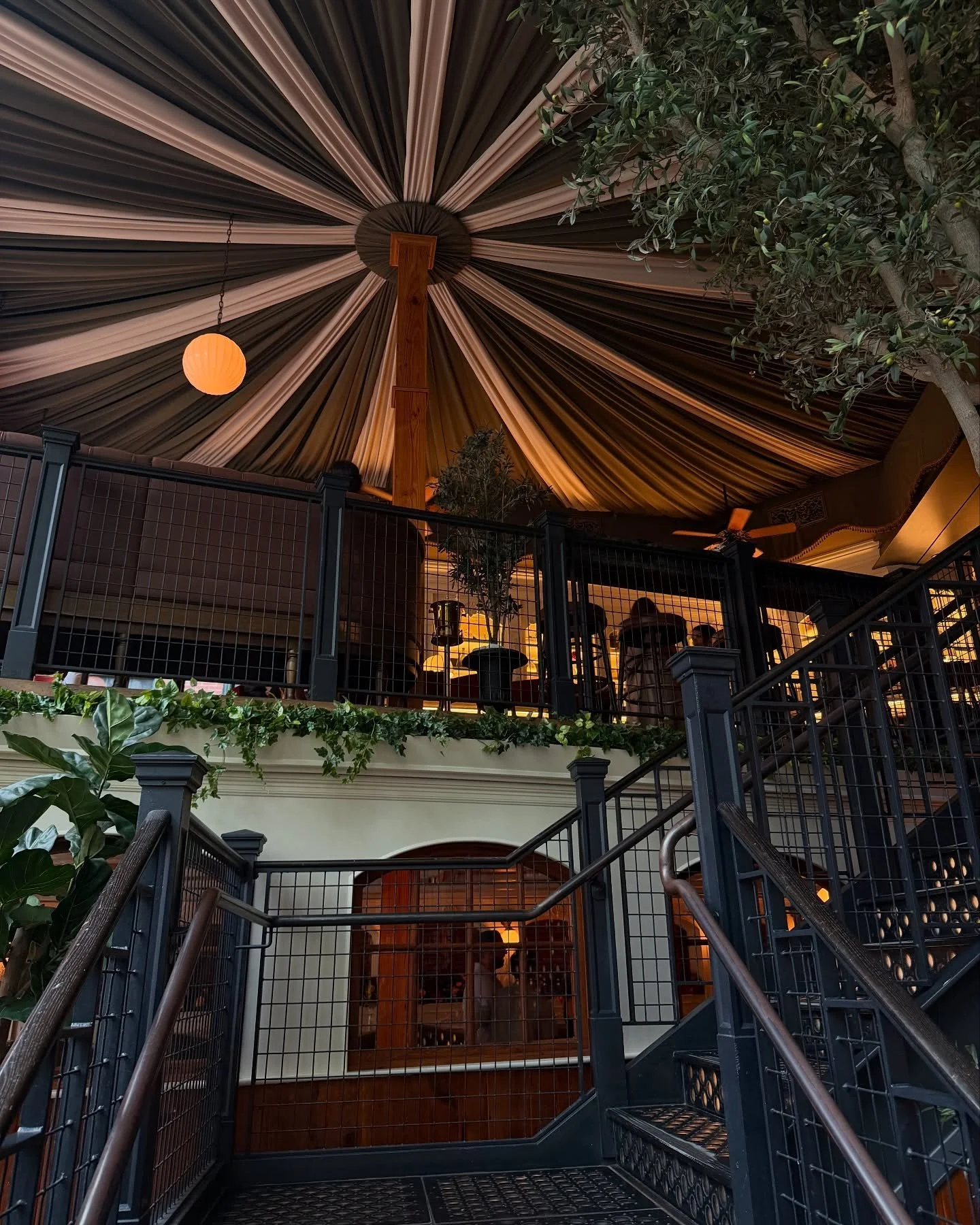 @capribos was amazing! MUST try the passion fruit martini - it was incredible.  Obsessed with the ceiling tent detail - whole interior is stunning.