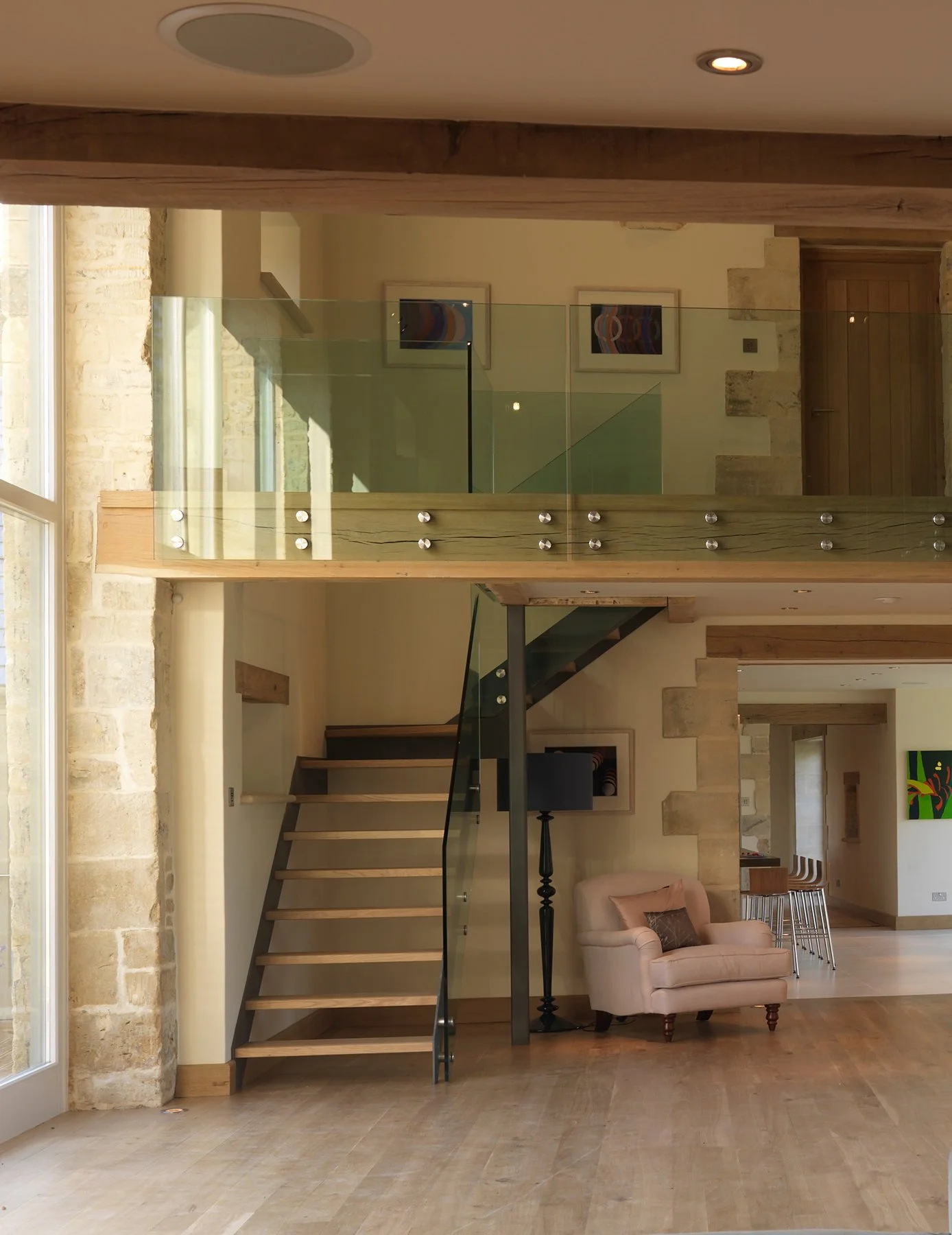 barnsley-hill-farm-living-room-glass-gallery-staircase.jpg