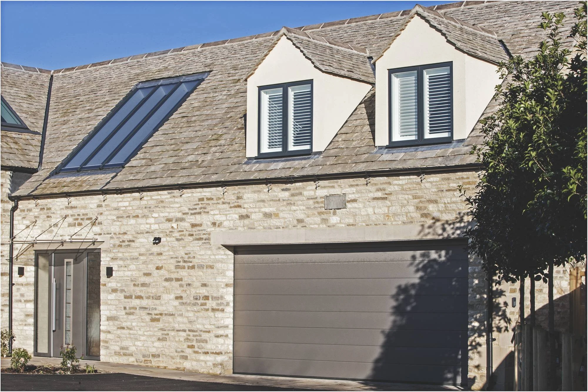 silver-birches-garage-dormers-and-stone-walls.jpg