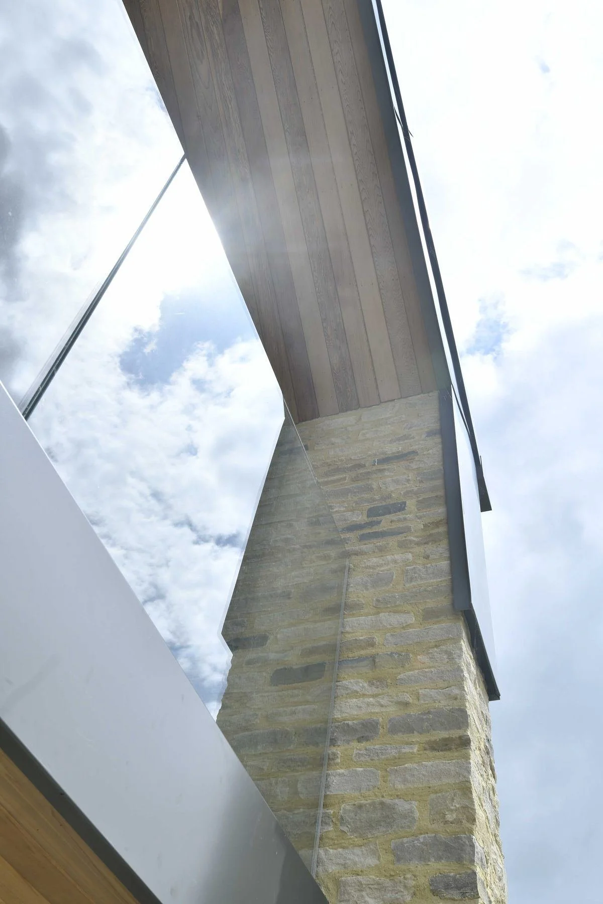 back-barn-natural-stone-pier-and-glass-balustrade-detail.jpg