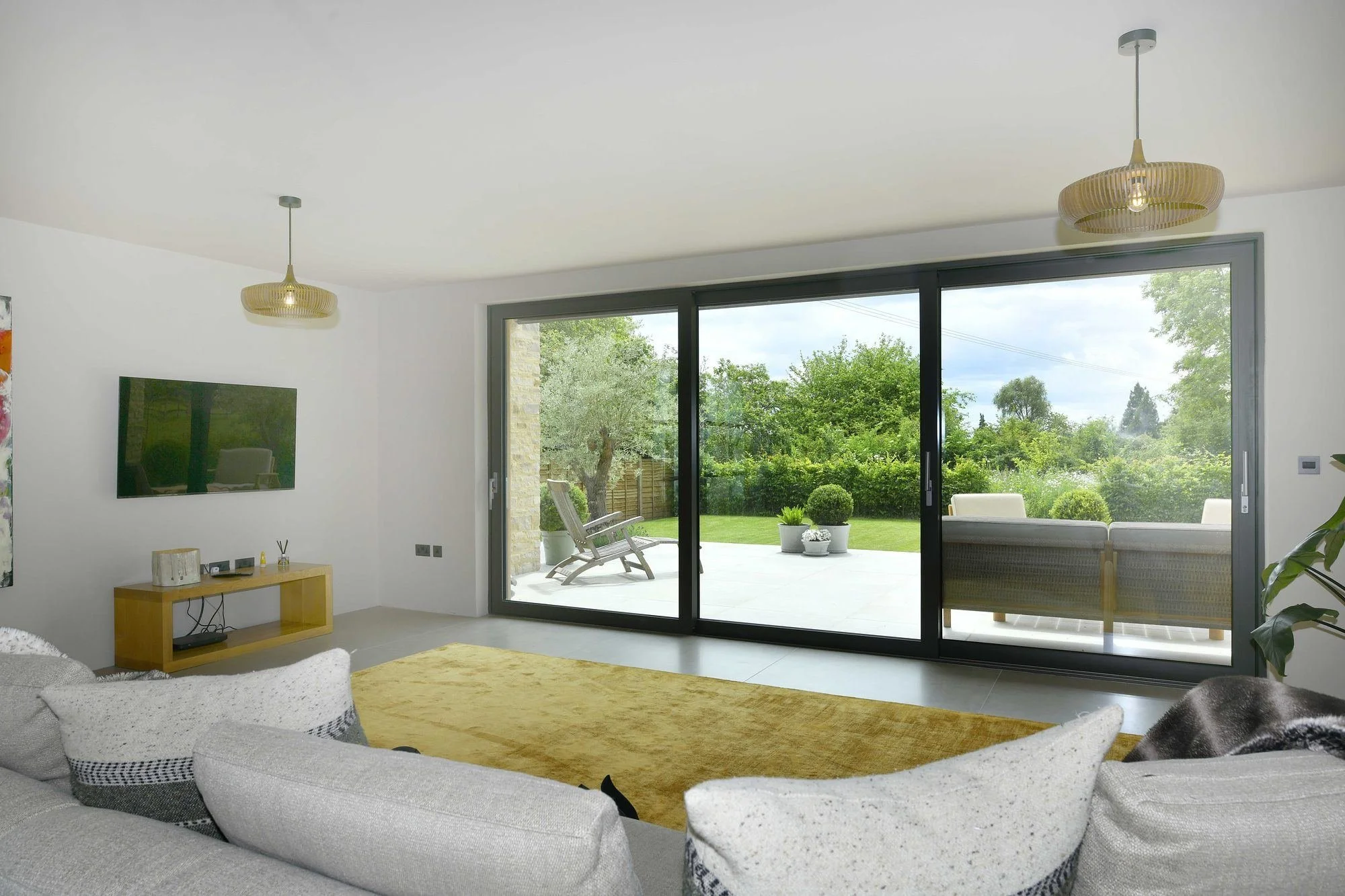 back-barn-living-room-sliding-doors-to-terrace.jpg