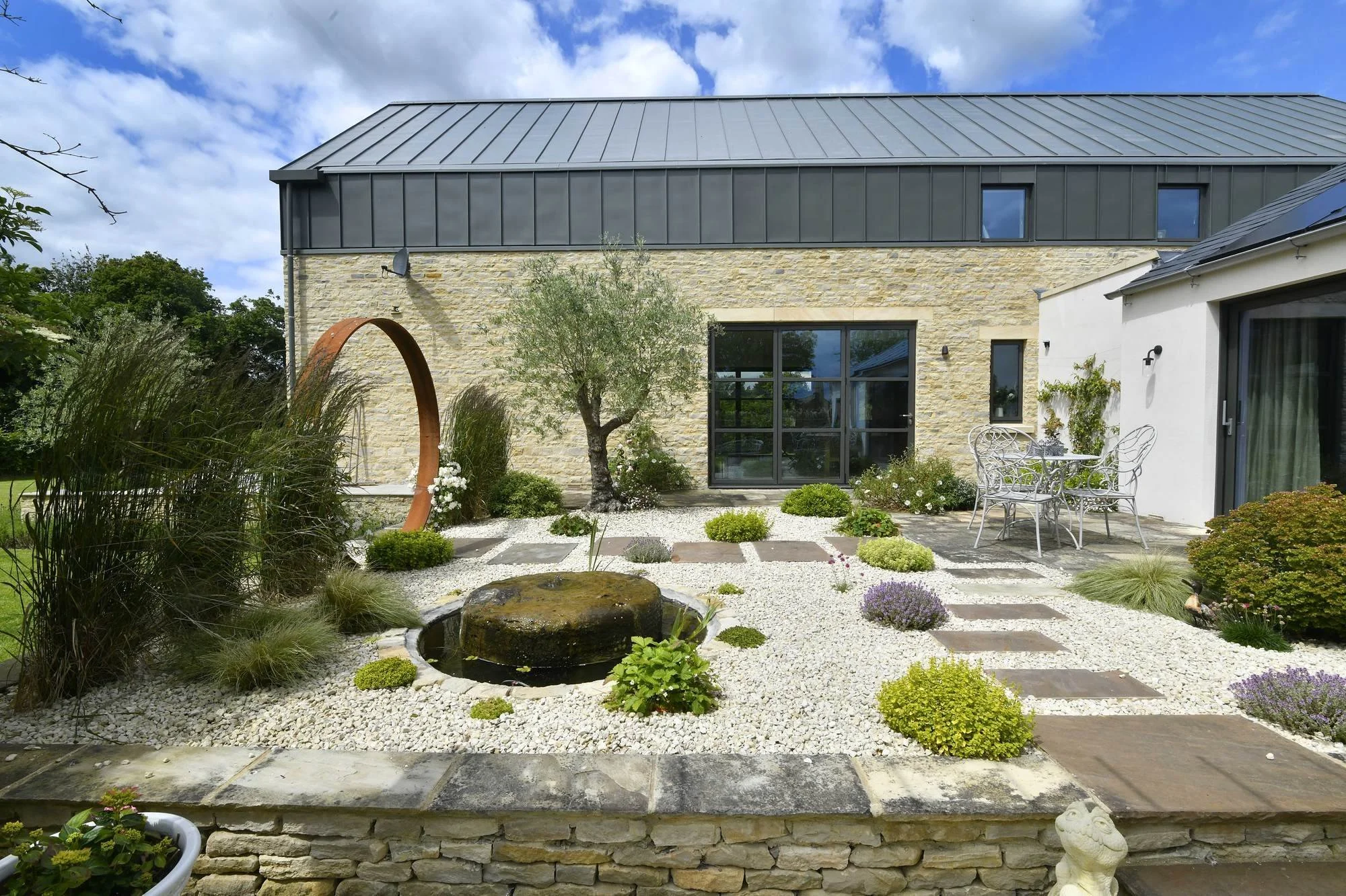 back-barn-zinc-clad-first-floor-and-courtyard-garden.jpg