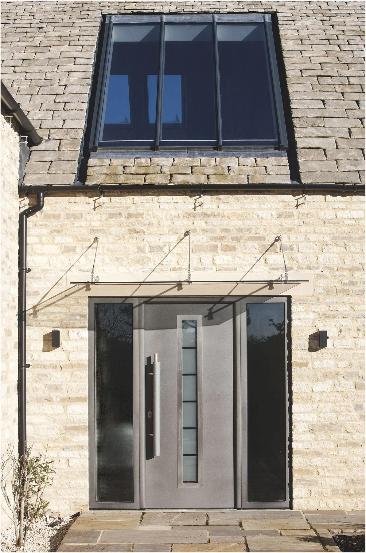 silver-birches-front-door-glass-canopy-and-rooflight.jpg