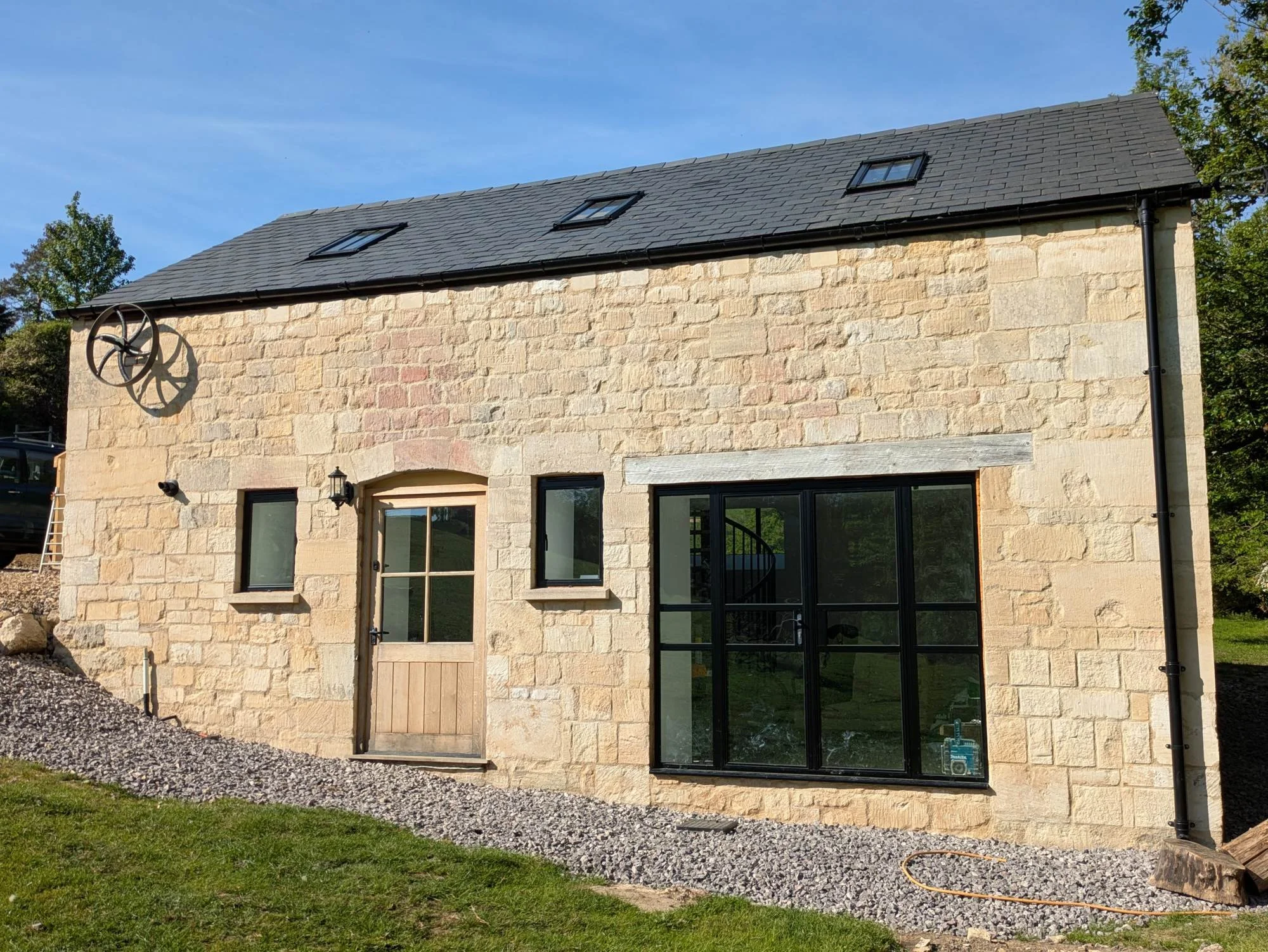 wades-mill-front-elevation-steel-framed-window-and-oak-door.jpg