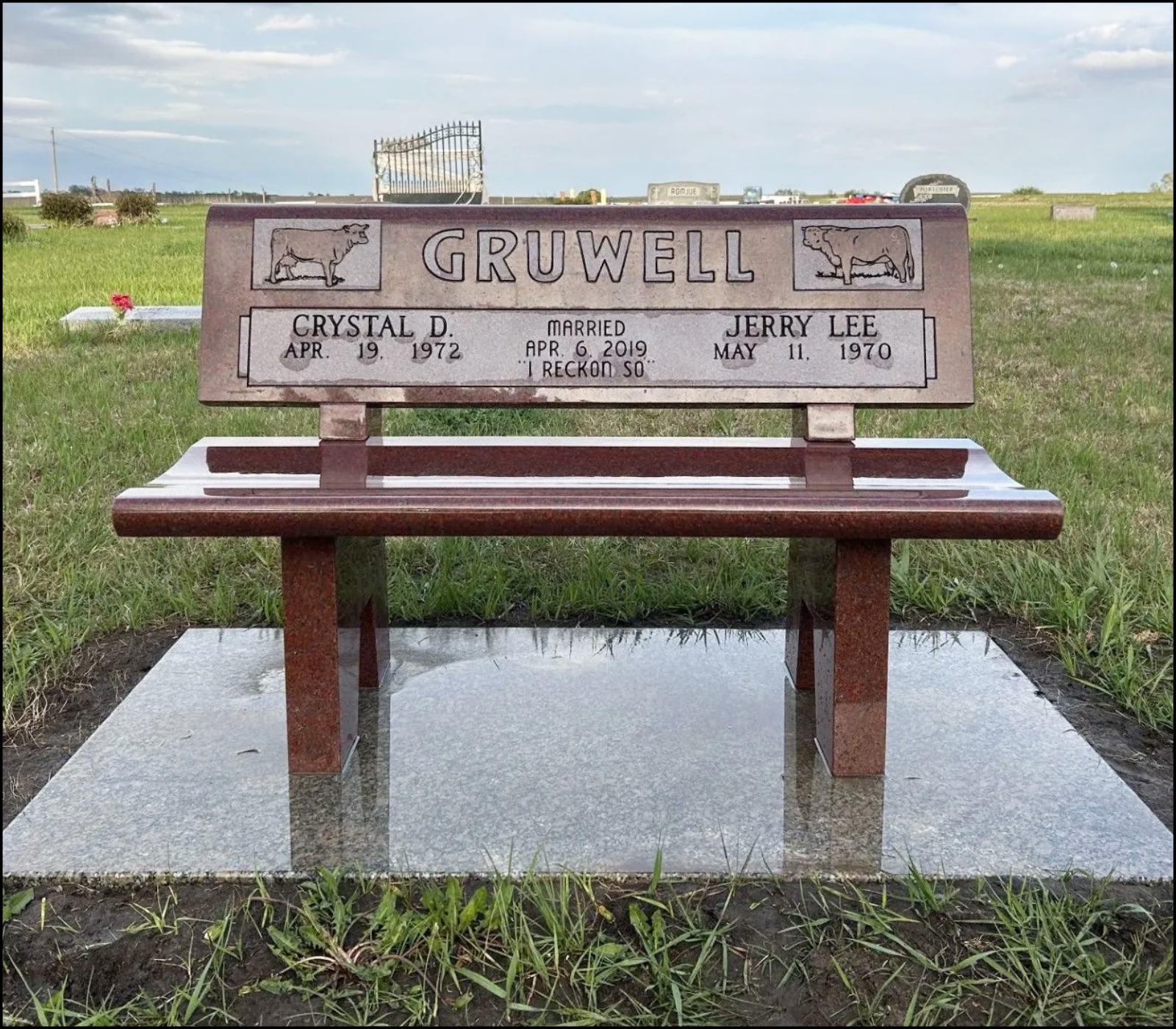 Gravestone in a cemetery with the name Gruwell, featuring images of a dog and a cow, and inscriptions for Crystal D. and Jerry Lee with their birth and death dates, and a marriage date.