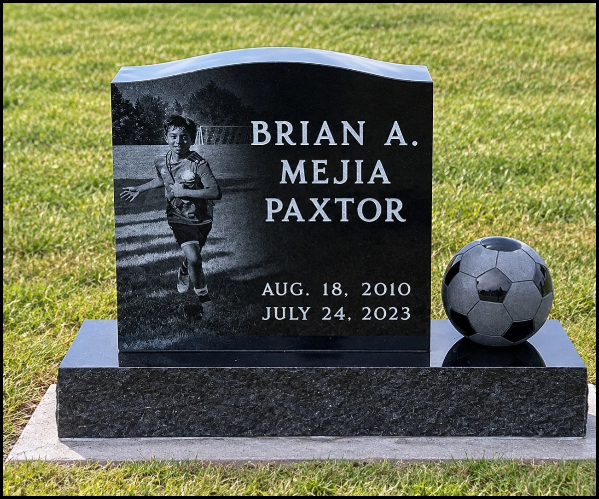 Grave marker for Brian A. Mejia Paxtor with a photo of a boy running on a soccer field engraved on the left side and a small soccer ball on the right side placed on the gravestone.