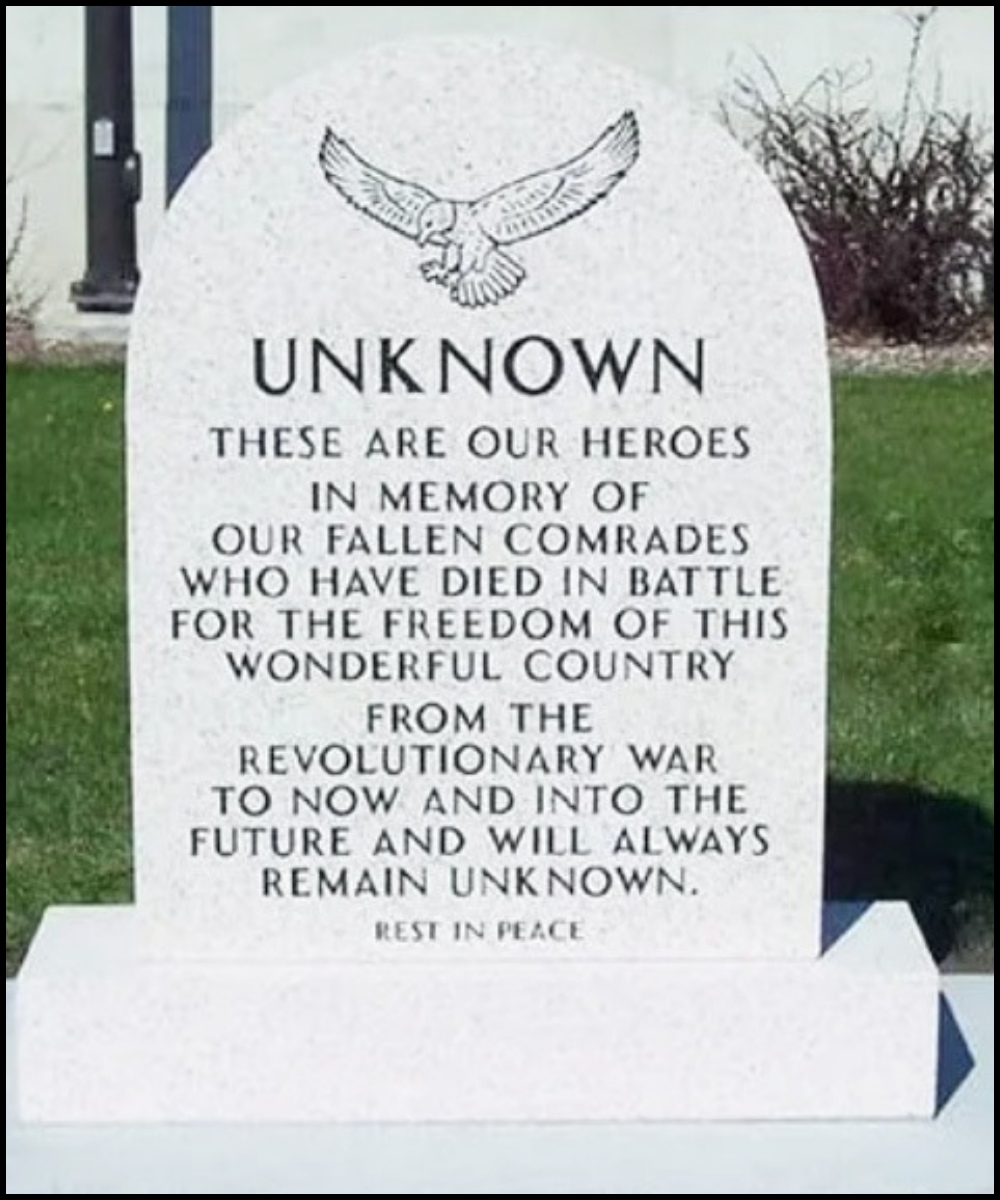 Granite memorial gravestone with an eagle engraving at the top, inscription honoring unknown fallen soldiers, referencing their sacrifice in wars for freedom, and ending with 'Rest in Peace.'