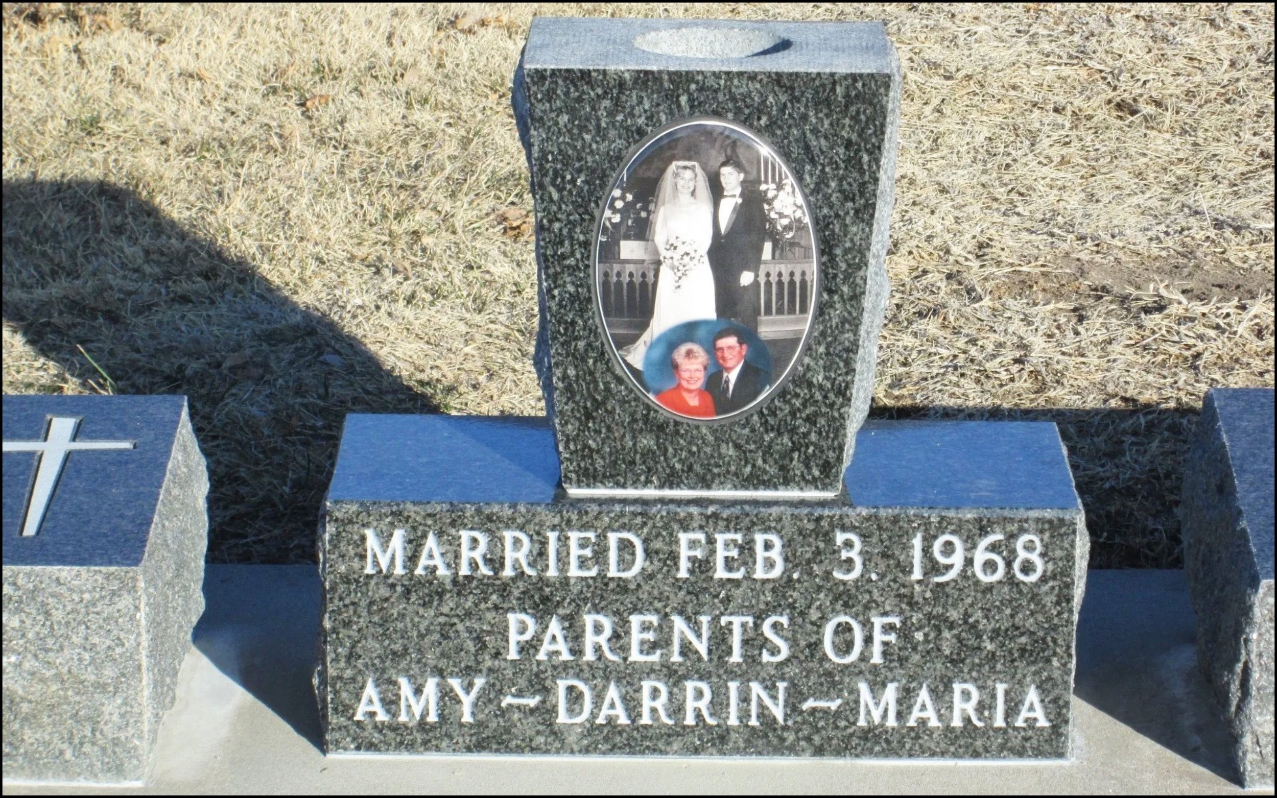Gravestone with a photo of a bride and groom, inscribed with "Married Feb 3, 1968" and the names Amy Darrin-Maria and parents of Amy Darrin-Maria.