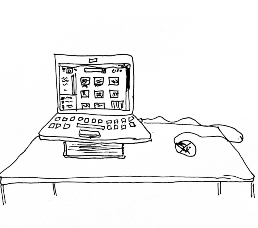 A simple black and white line drawing of a computer on a desk, with a mouse on the right side.