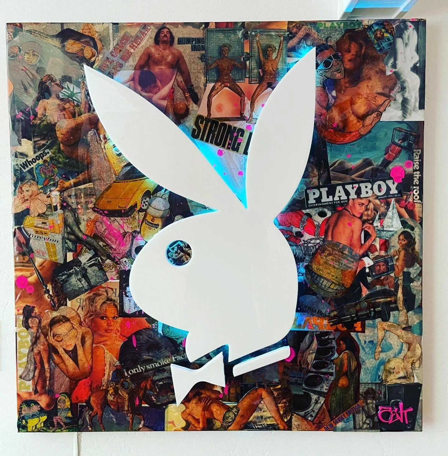 A collage of vintage magazine and poster images with a large white Playboy bunny logo cutout in the center, surrounded by colorful images of women, cars, and pop culture references.
