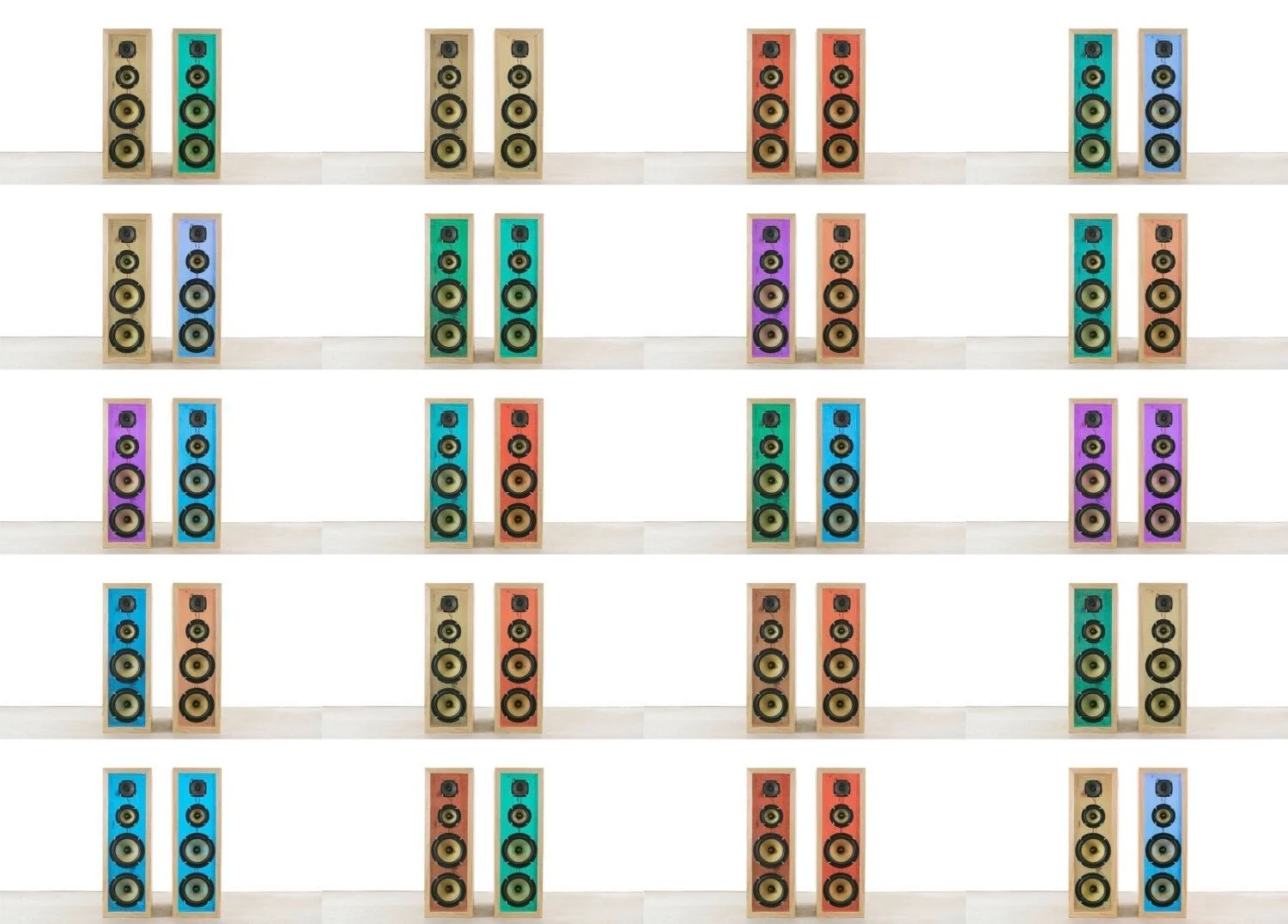Multiple pairs of colorful vintage speakers arranged on white shelves, with each pair in a different color or combination of colors.