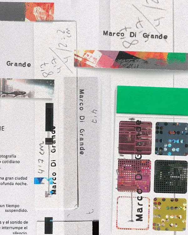 Close-up of various pieces of paper, labels, and colorful film such as film used for photography, with text including 'Marco Di Grande' and handwritten notes.