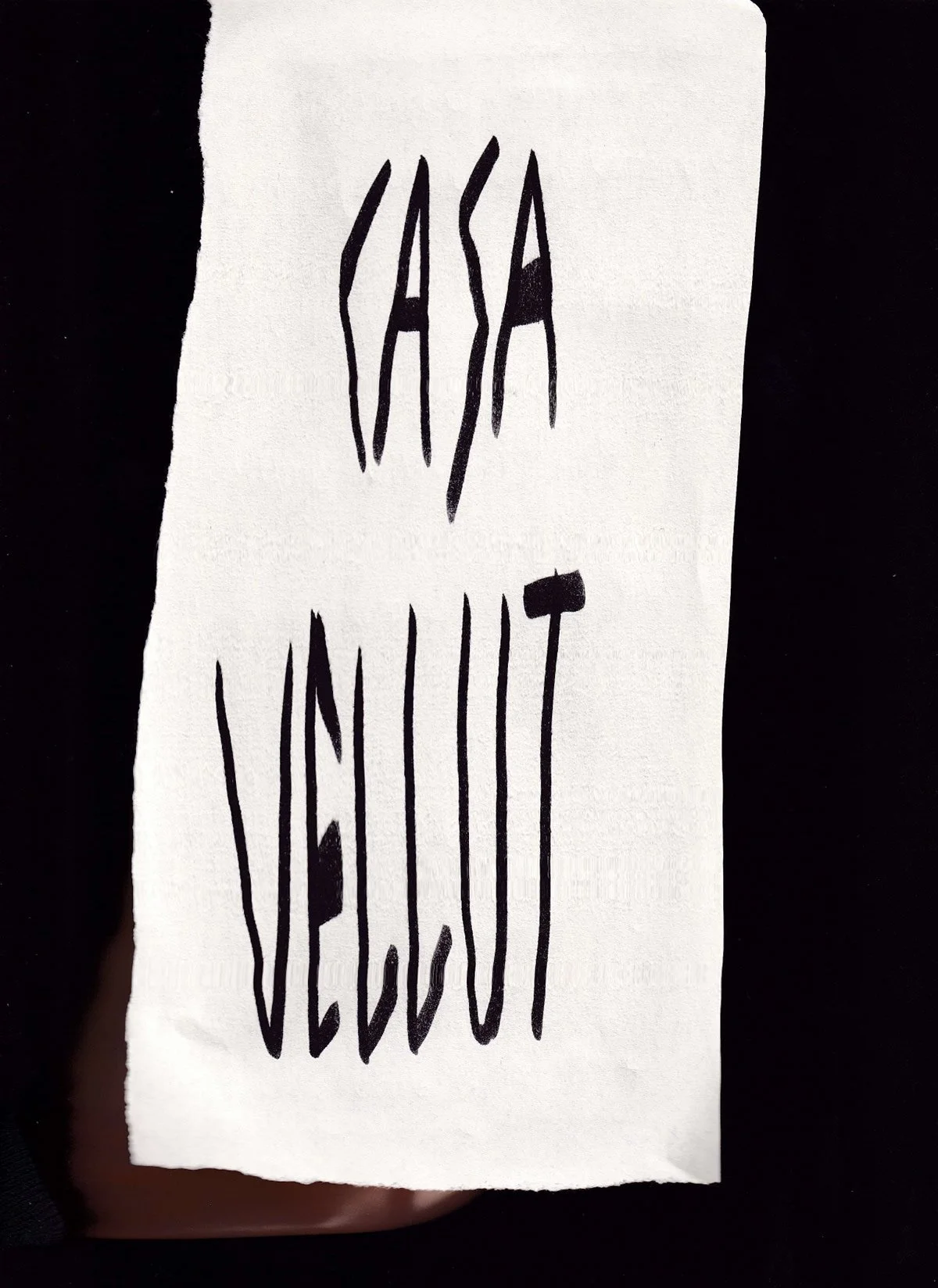 Hand-drawn black text on white paper says 'KASA' at the top and 'VIGELIT' at the bottom.