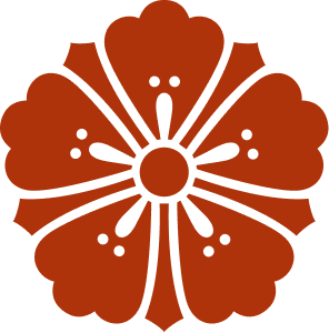 Stylized red KODO flower with five petals and black dots on each petal