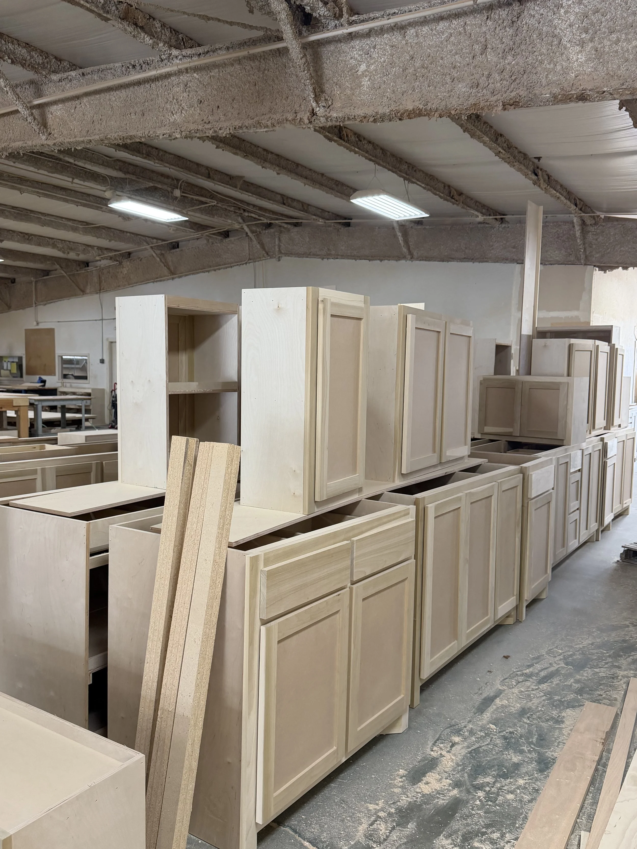 Wooden kitchen cabinet doors in a woodworking shop