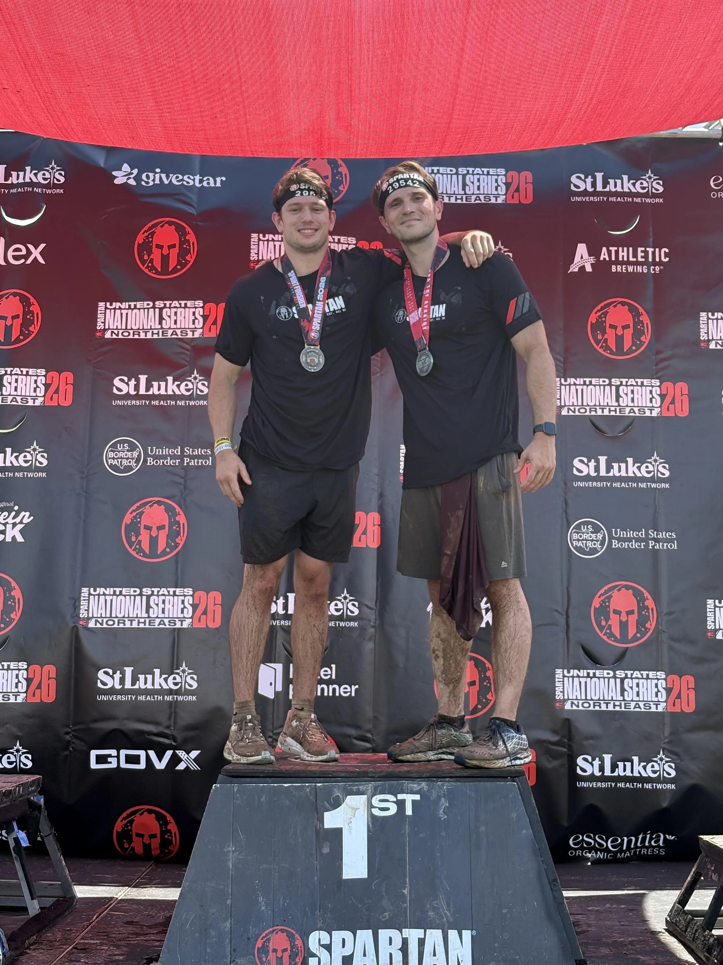 Chase Hoover, LPC, founder of Steady Wings Counseling, competing in a Spartan Race obstacle course event, reflecting his passion for athletics, mental resilience, and sports performance counseling in Philadelphia, PA.