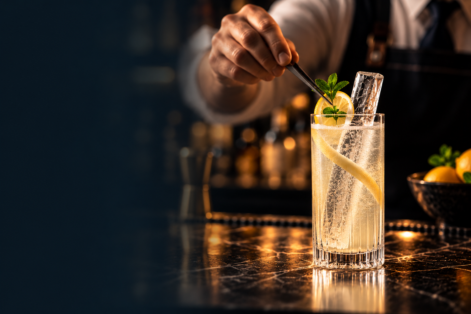 Bartender finishing a highball cocktail