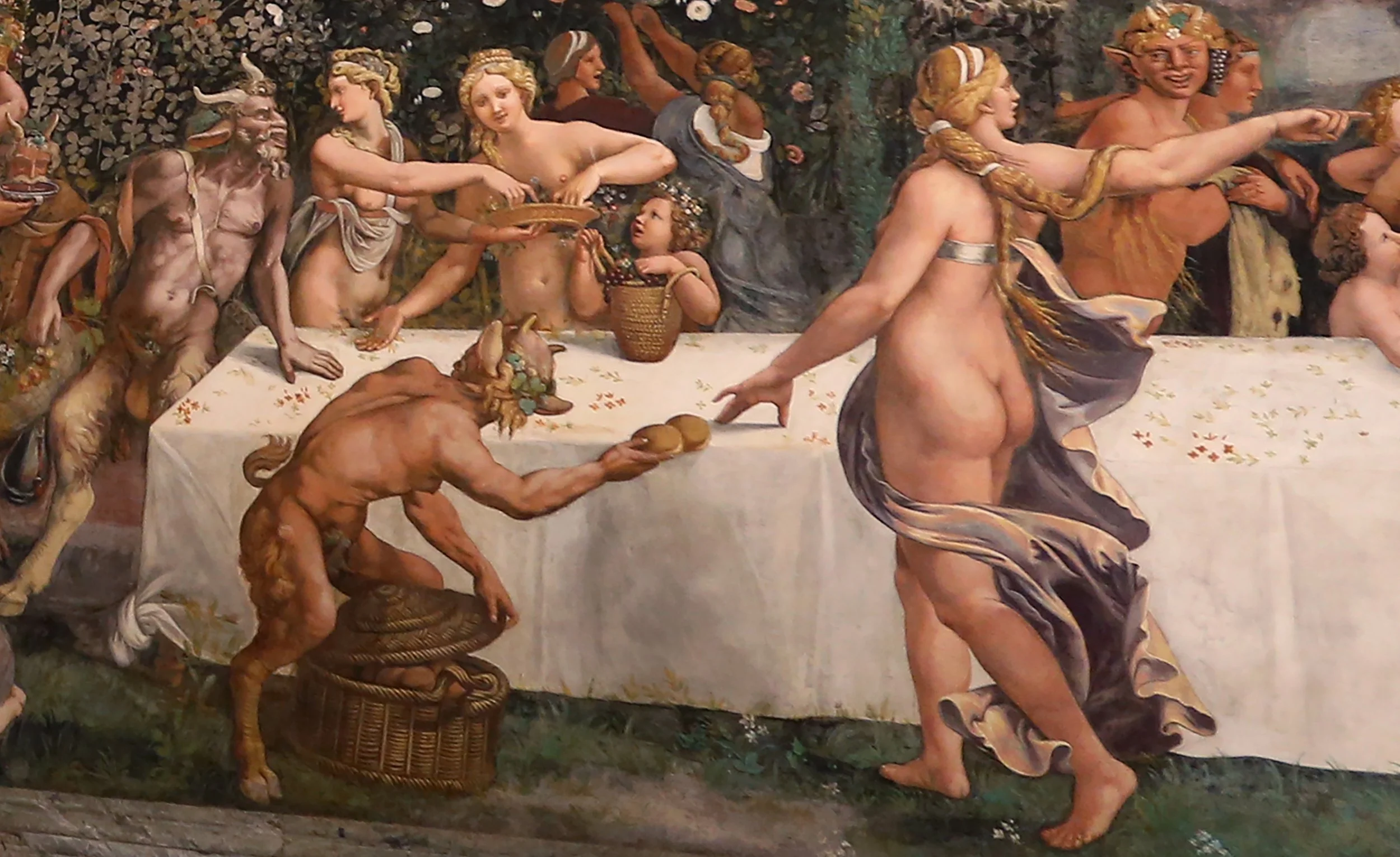 Figure 4.3: Figure 4.3 Two Horae scattering flowers, watched by two satyrs, detail of the rustic banquet celebrating the marriage of Cupid and Psyche from the Sala di Amore e
Psiche, 1528, fresco by Giulio Romano, Palazzo del Te, Mantua. Perspective 