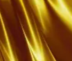 Gold-colored silk fabric with smooth, shiny texture and flowing folds.