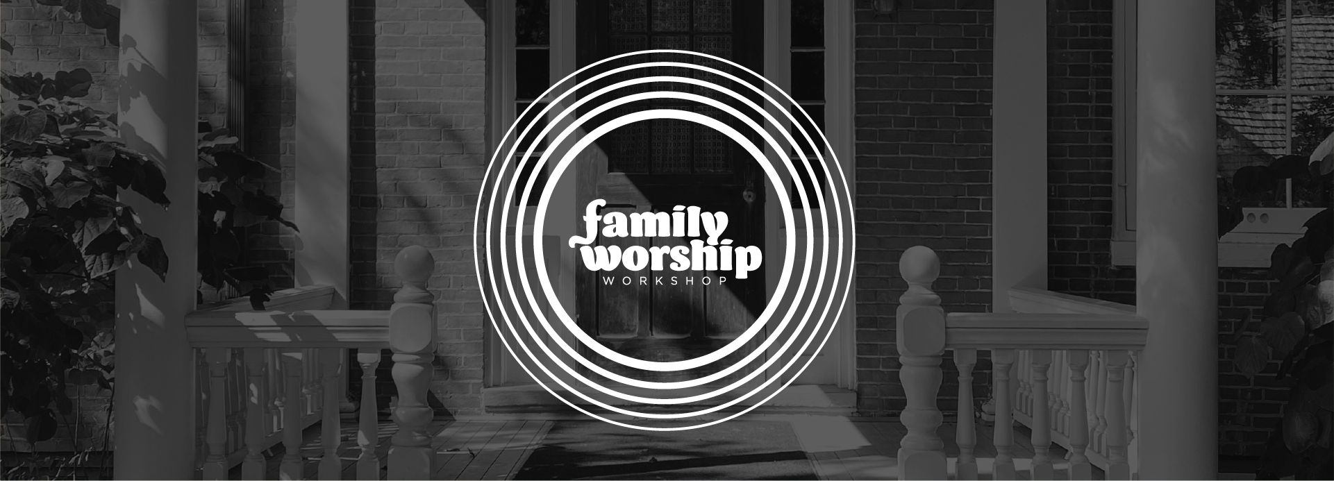 Family Worship Workshop logo over a black-and-white view of a brick home’s front porch and door