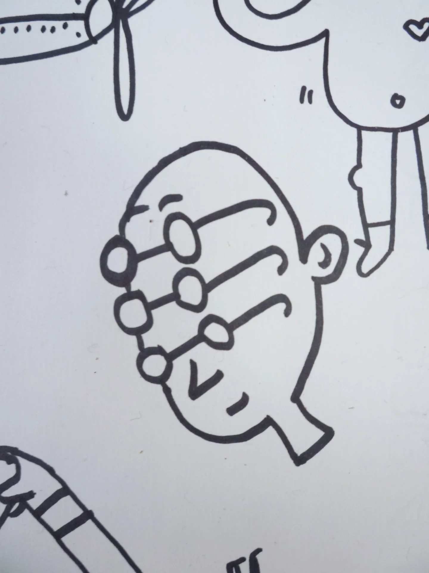 Detail of hand-drawn character illustration showcasing bold, minimalist ink linework.