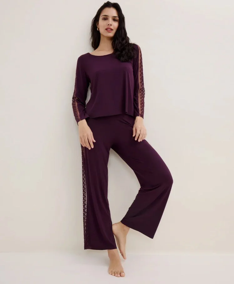 Plum long-sleeve pajama set with sheer lace panels down the sleeves and legs